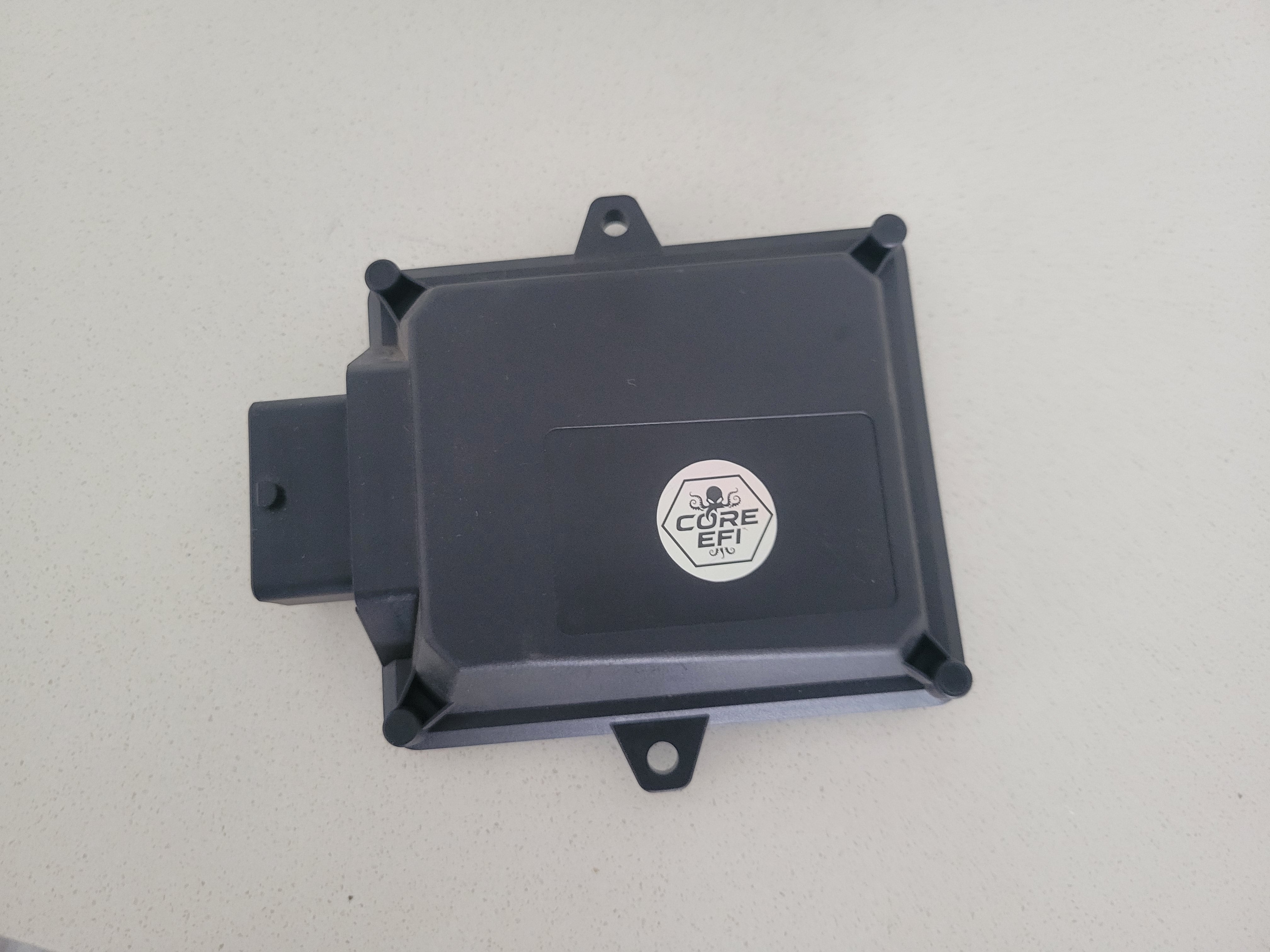 Core EFI V4 board in an open black enclosure with USB